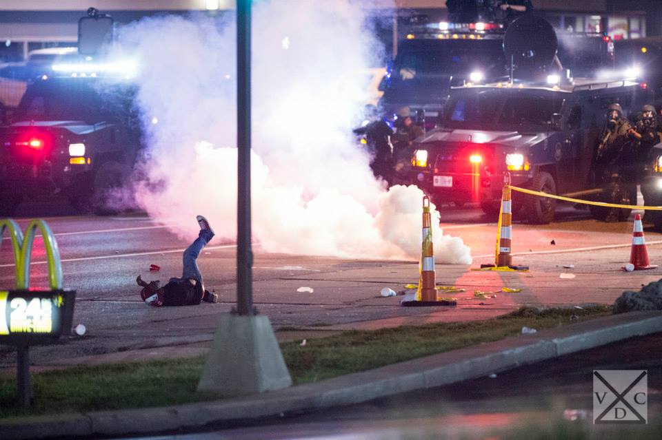 Police firing tear gas to disperse crowds in Ferguson, Missouri. Photo by VDC Photo 2014 
