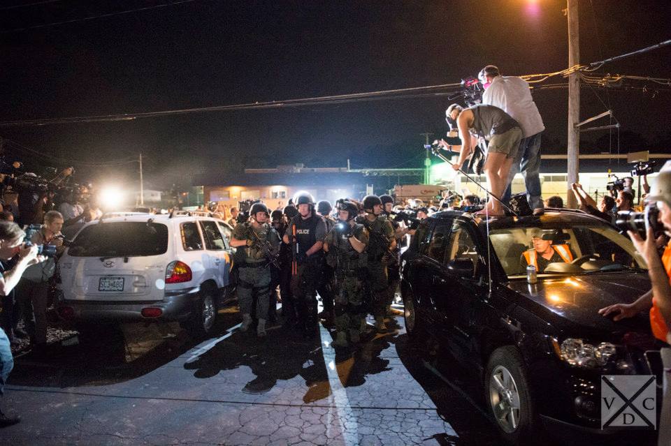 A big police presence amidst many media outlets in Ferguson, Missouri. [Abe Van Dyke | VDC Photo]