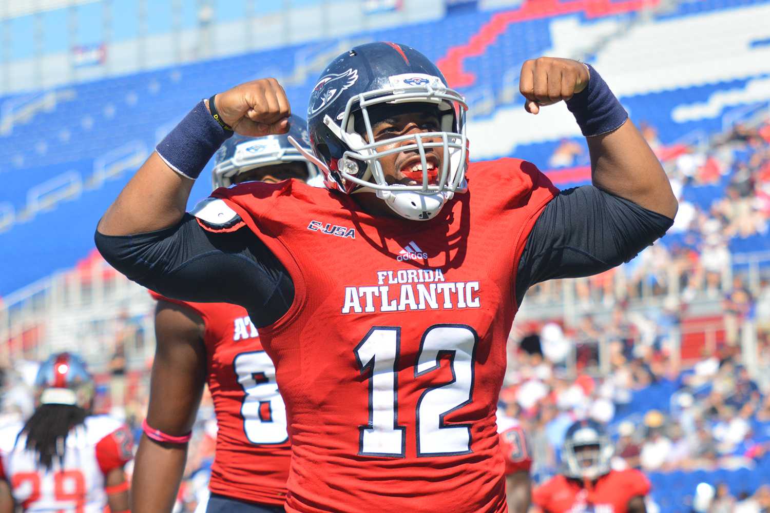 Michelle Friswell | Creative Director Quarterback Jaquez Johnson celebrates after scoring his second touchdown in FAU’s 45-38 win over WKU on Saturday.   