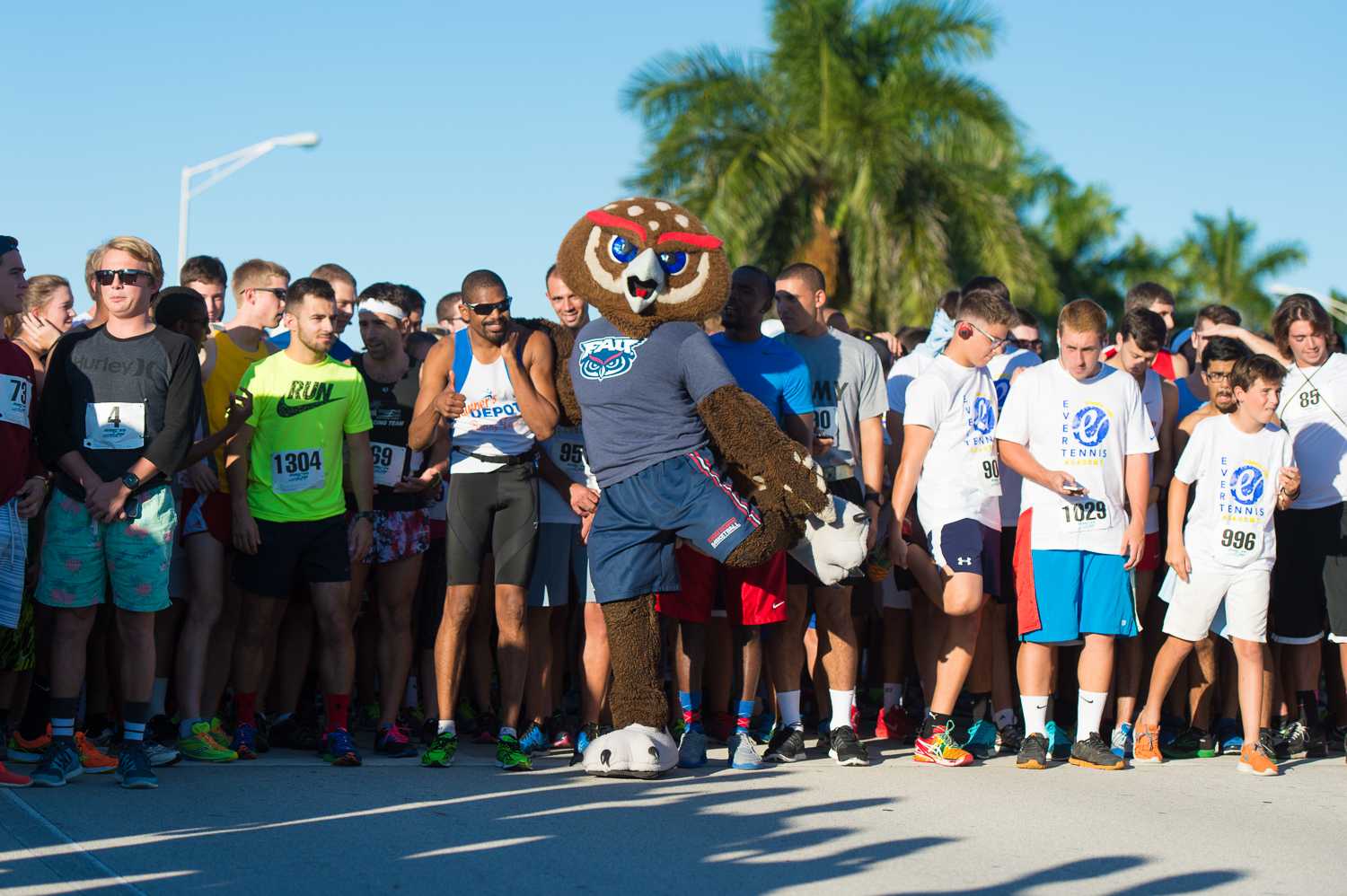 Max Jackson | Photo Editor Owsley and the rest of the runners stretching and getting ready for the 5K portion of FAU’s Annual Homecoming Run for Autism to begin.