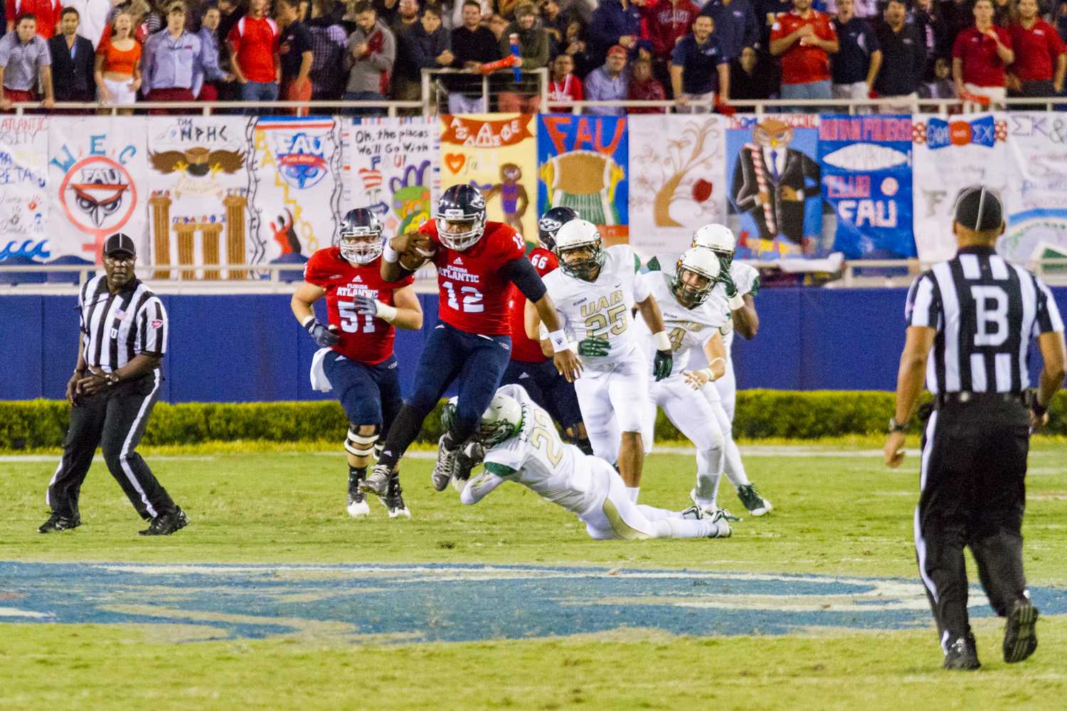 [ Mohammed F Emran | Web Editor ]  Quarterback Jaquez Johnson rushes for 18 yards to the FAU 46 for a first down. 