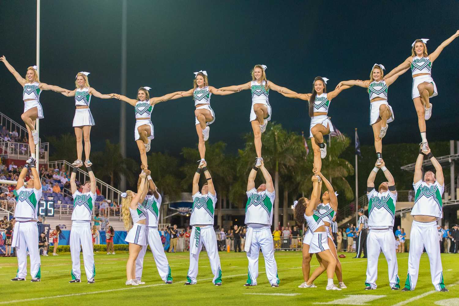 Marshall cheerleaders perform during a pause in play. 