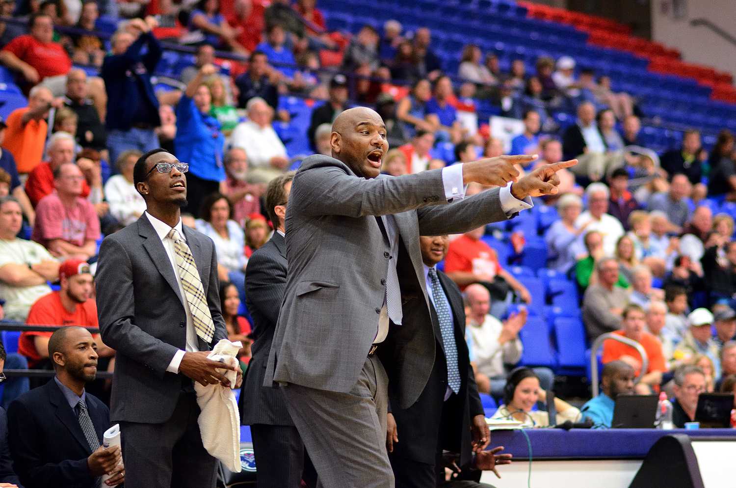 Head coach Michael Curry directs his team during the final minutes of Saturday night’s victory over Marshall.