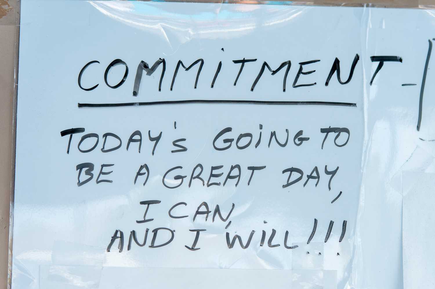A motivational sign that hangs on a door by the FAU pool on the day of the match.