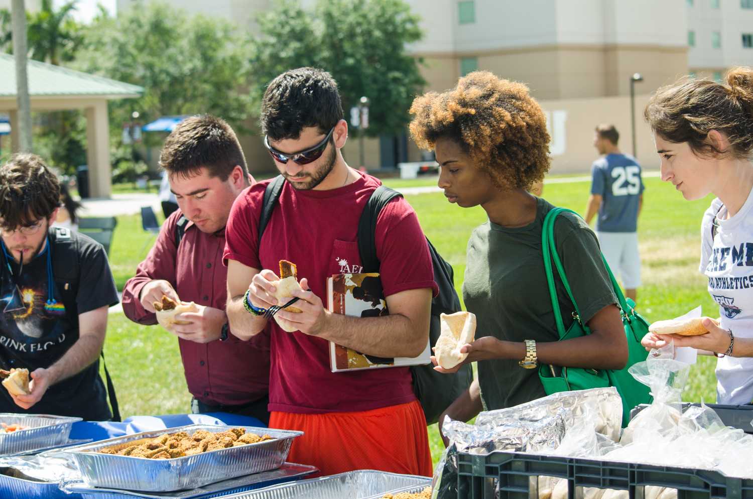 Students enjoying the free traditional food at the Israel Independence Day Carnival. 