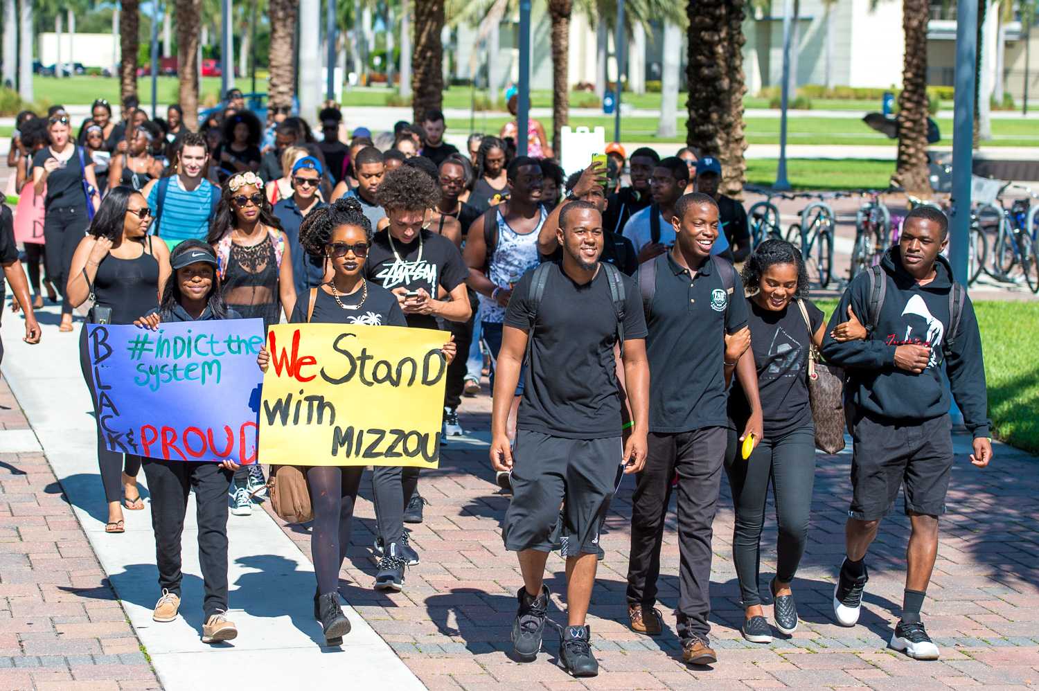 Approximately 60 students, dressed in all black started a march outside of the campus Recreation Center to show support for black students at the University of Missouri. Max Jackson |Staff Photographer 