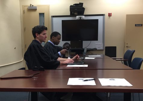 Members of the student court (left to right), Seamus Maloney, the Boca Raton associate justice, with Khalil Ricketts, the chief justice, and Saheed Oluwasina Oseni, Broward associate justice at the court meeting to hear Elections Chair Gregory Barber's defense for not fully completing his job duties. Photo by Gregory Cox | Managing Editor