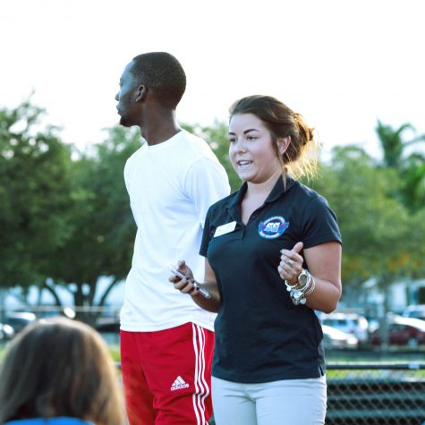 Kappa Alpha Psi President Javonte Wilkerson and Student Government director of government relations Jessica McMillan address the crowd of students at the FAU Track and Field Complex Friday. Patrick Delaney | Photo Editor