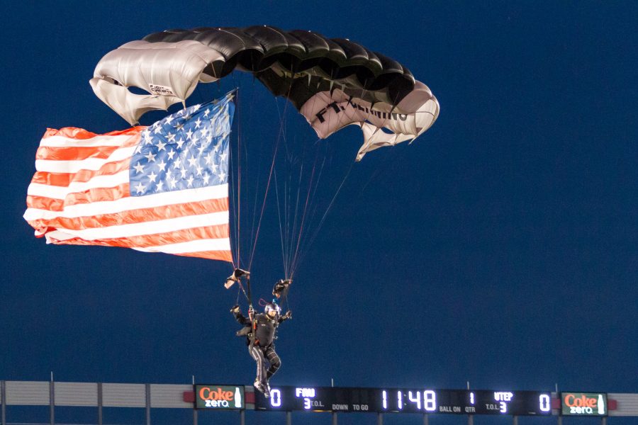 Veteran skydivers opened up the game with American flags and sparklers. Alexis Hayward | Contributing Photgrapher