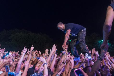 Method Man being held up by the crowd after jumping straight into the sea of people during the Freaker's Ball. Photo: Max Jackson