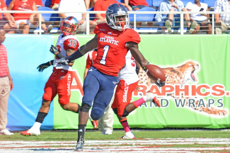 Michelle Friswell | Creative Director 
Wide receiver Lucky Whitehead scores what would become the game-winning touchdown for FAU with 01:28 remaining in the game. 
