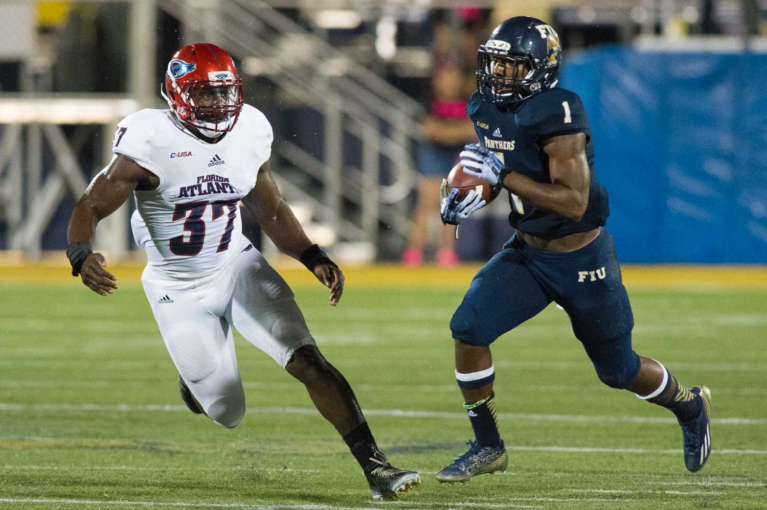 David Lozandier chases Florida International running back Alex Gardner in what will be his last game, a 38-10 loss to FIU on October 2. Photo by Max Jackson, Photo Editor