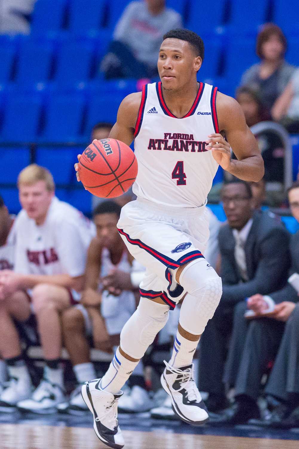 Freshman guard Justin Massey scored 17 points in the loss to Harvard on Nov. 17. Photo by Max Jackson