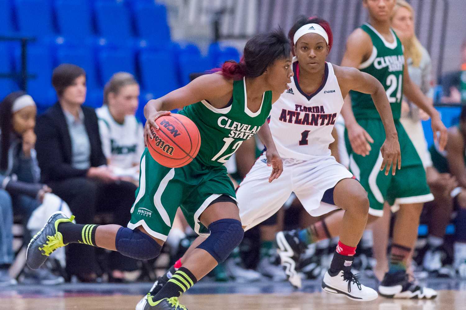 Cleveland guard Brooke Smith attempts to make it past FAU guard Aaliyah Dotson to get to the basket.