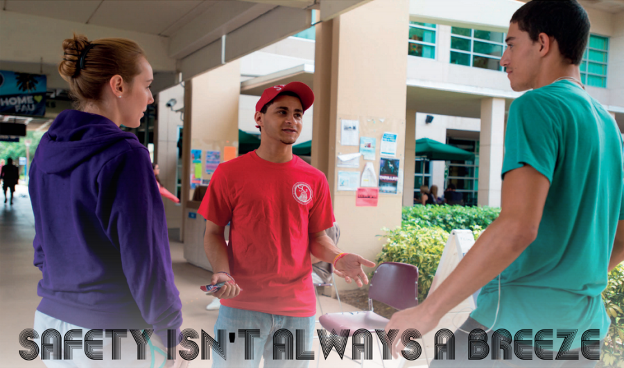 Student Government house speaker Christopher Ferreira stops two students to discuss the Breezeway Safety Campaign and explains possible consequences of violating the rules of the Breezeway Max Jackson | Photo Editor 