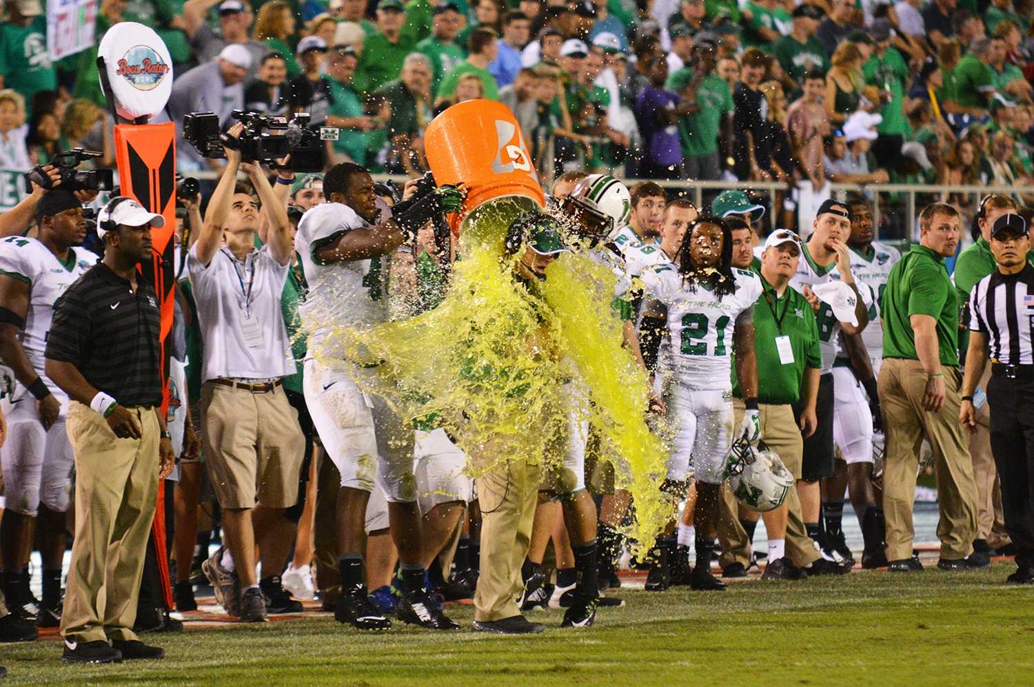 Two players gave head coach Doc Holliday a traditional Gatorade bath in celebration of their 52-23 win over Northern Illinois in the first-ever Boca Raton Bowl on Dec. 23. Holliday agreed to an extension in principle with Marshall on the previous day. 