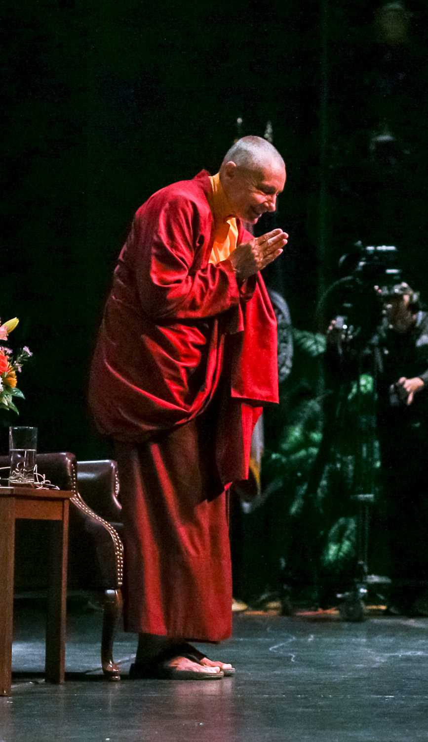 Buddhist nun Jetsunma Tenzin Palmo bows with gratitude to the audience after her lecture on Monday, Jan. 5 in the University Theater. “If we really want a peaceful world, we have to have a peaceful mind. Each one of us is responsible.” Kiki Baxter | Contributing Photographer  