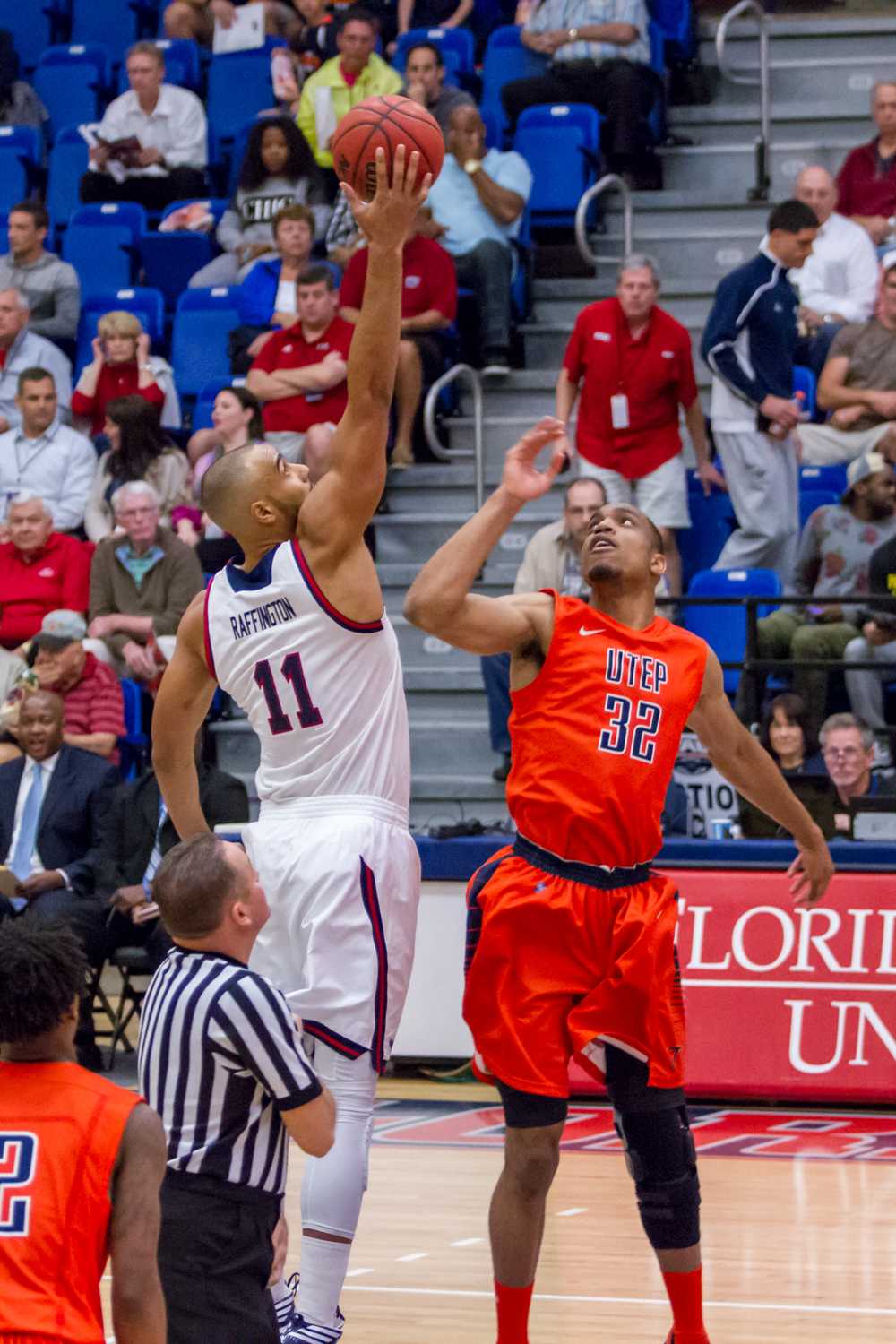 Raffington wins the tip-off over UTEP sophomore forward Vince Hunter. Hunter scored a team-leading 22 points on the night.