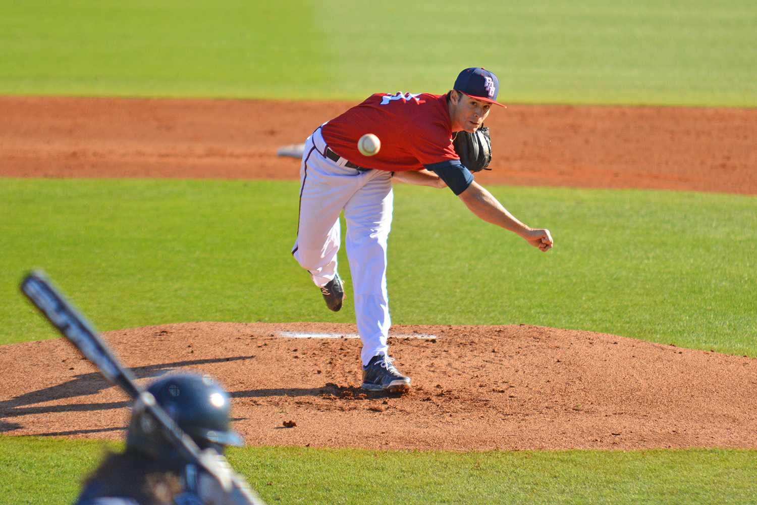 Senior pitcher Drew Jackson delivers a pitch to a UConn batter in the second game of the series. Jackson lasted 6 1/3 innings, striking out nine and walking one. 