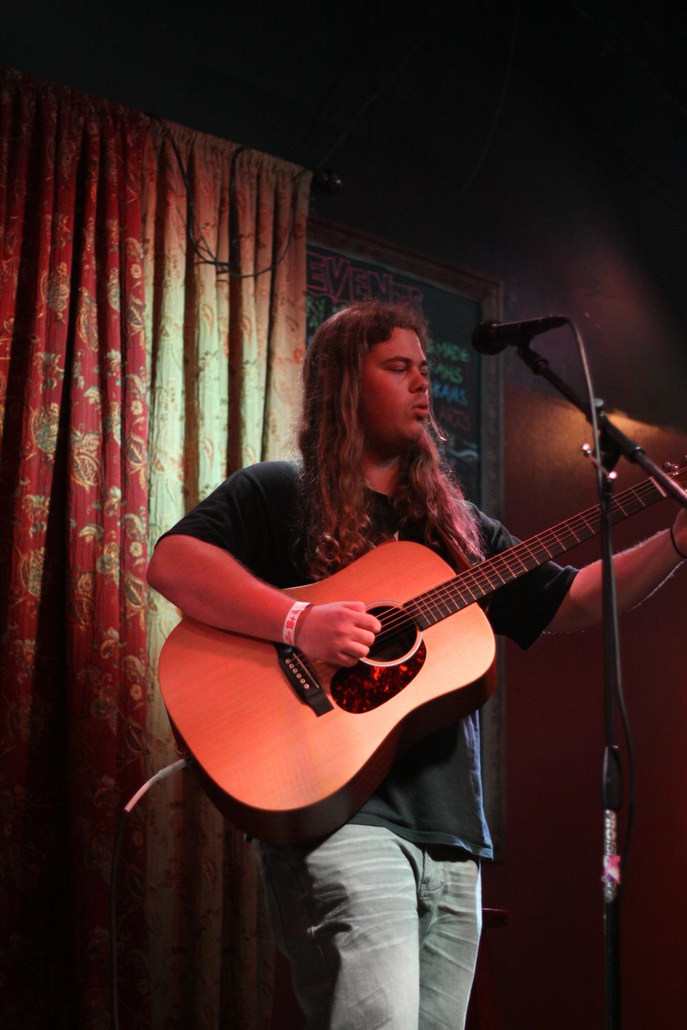 Garrett Kealer, a junior commercial music major, delivering a colorful performance at the Funky Buddha Lounge & Brewery in Boca Raton, Fla. on Feb. 6. Josh Talero | Contributing Photographer