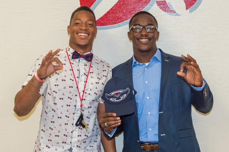 Jalen Young and Kerrith Whyte posing for a photo after signing to FAU. Max Jackson | Photo Editor