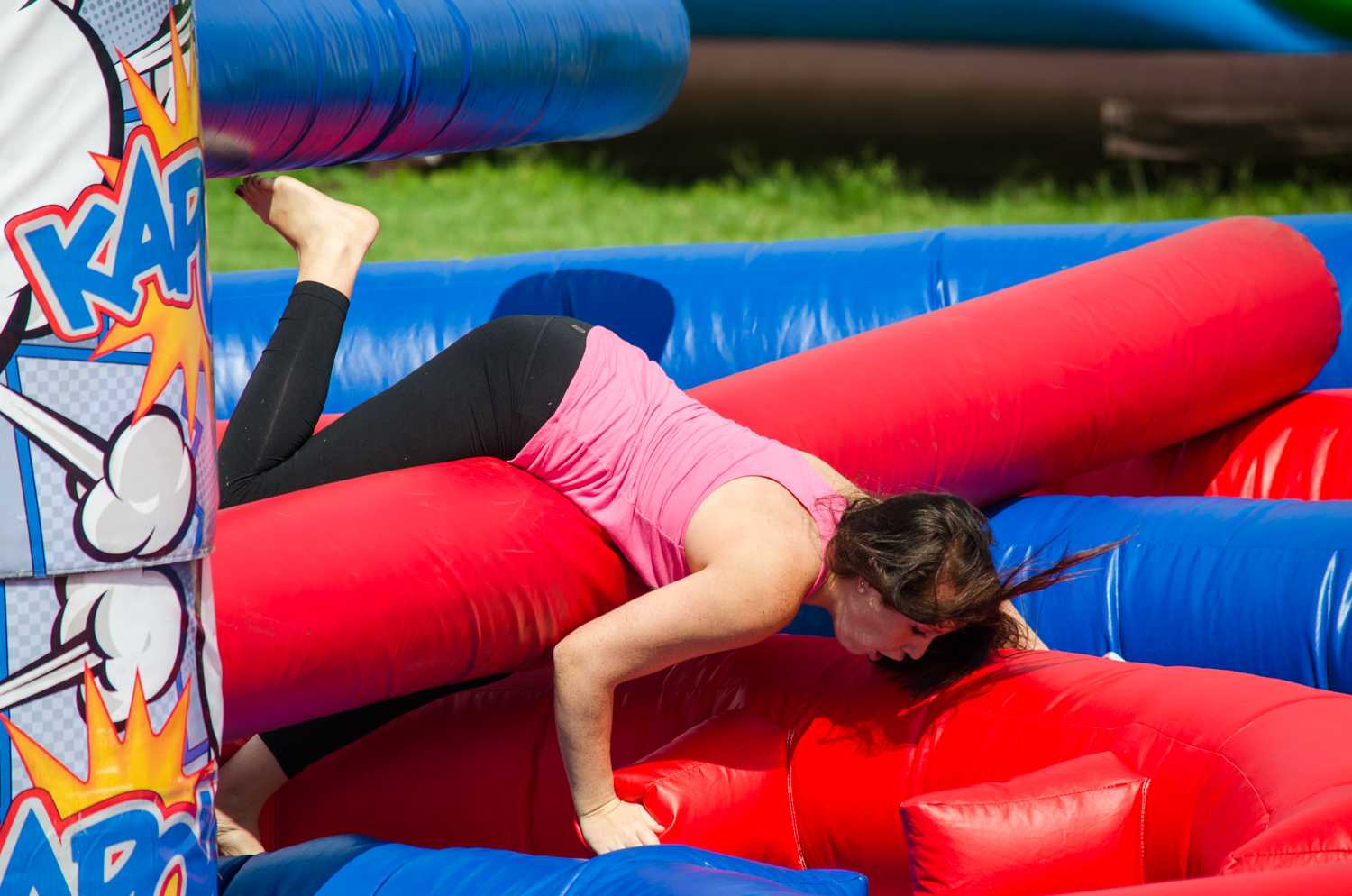 The swinging arms on the obstacle course are harder to avoid than they seem. 