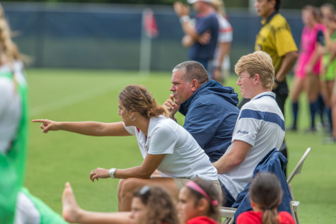 FAU Assistant Coach Jordan Reppell talks with Head Coach Patrick Baker during the second half of Sunday’s game against UTSA. Brandon Harrington|Photo Editor