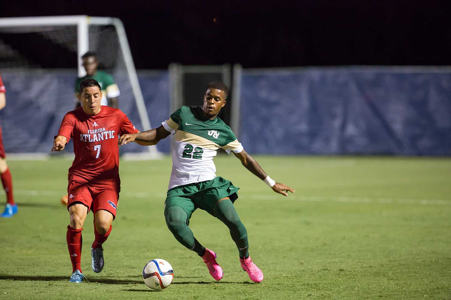  Senior midfielder Ronald Garcia (7) fights for possession against junior defender Joe Amico (22) in the Owls’ first home game of the season against the Jacksonville Dolphins. Brandon Harrington | Contributing Photographer 