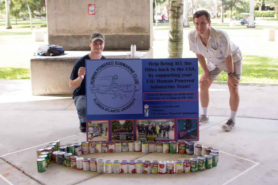 Michael Denny 
and Josh Jacobs of the Human Powered Submarine Club promote their club during ExtravaCANza in 2015. Their submarine sculpture took them about 10 minutes to make. Photo courtesy of Patrick Martin