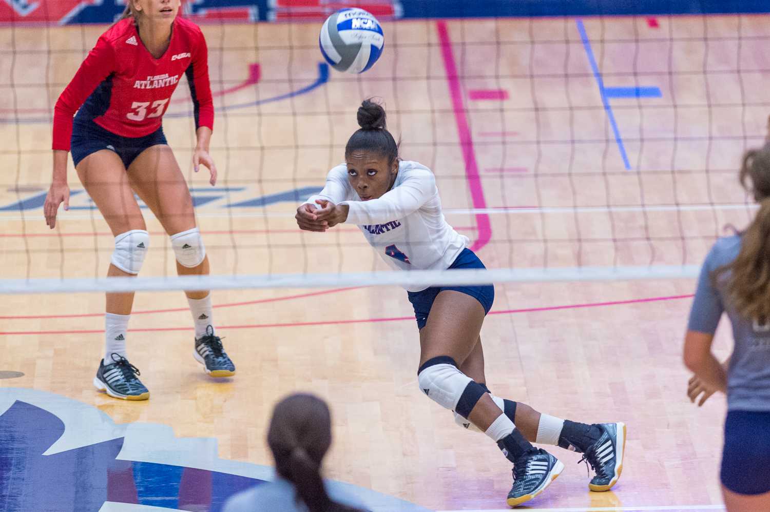 FAU junior outside hitter Raveen Golston (4) runs to dig the ball during Friday’s match versus UTEP. Golston played as the team’s libero during the match. Max Jackson | Staff Photographer