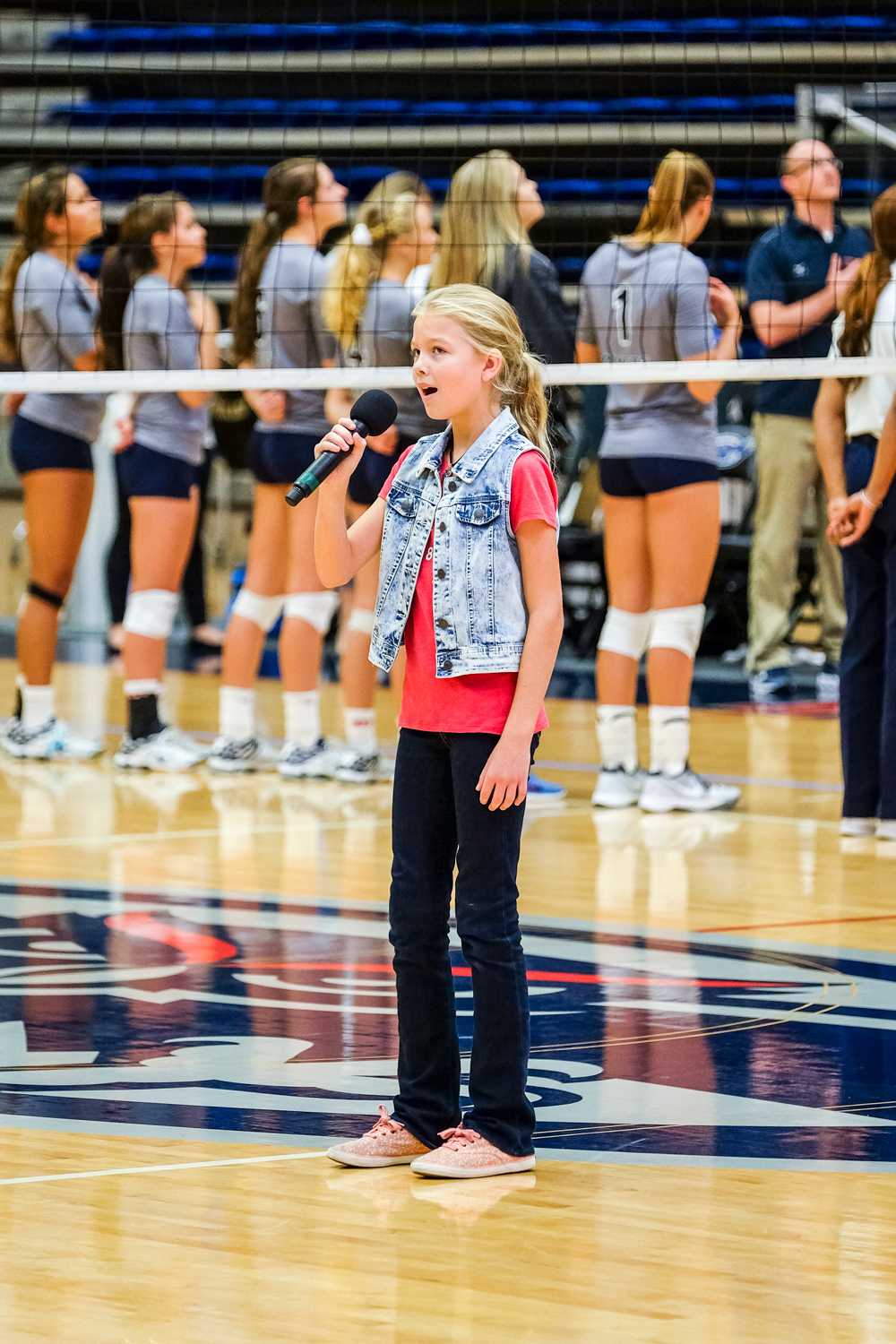 A young performer sings the National Anthem before the start of Friday’s match between UTEP and FAU. Mohammed F Emran | Staff Photographer