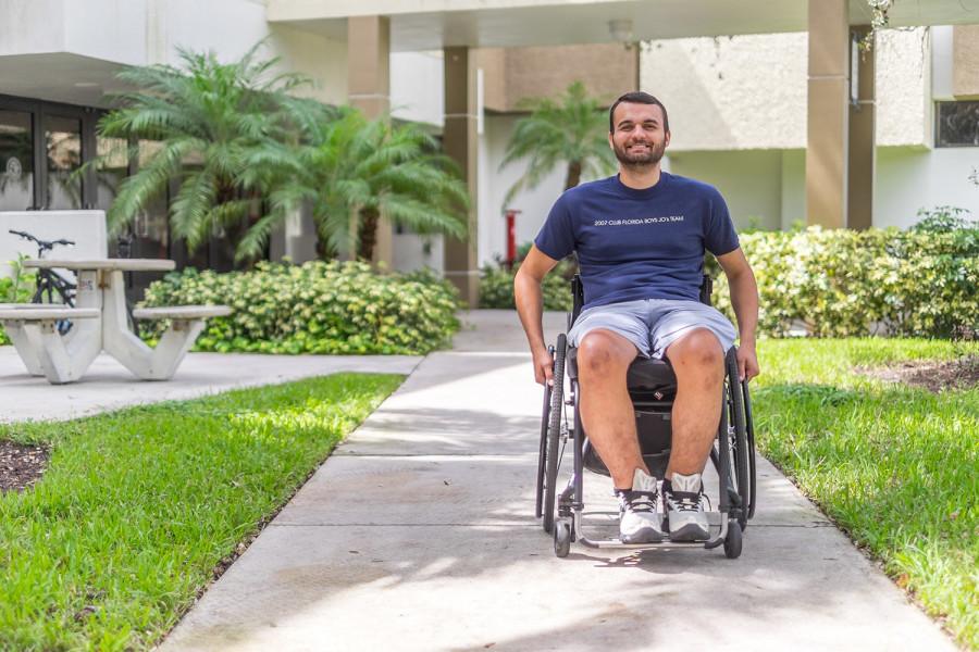 Junior communication major Nick Williams receives accommodations for his physical and mental disability. Mohammed F. Emran | Asst. Creative Director