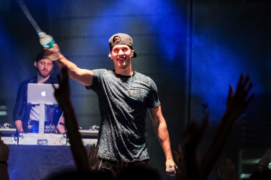 Cal Shapiro of Timeflies sprays water at the crowd of about 200 people. Mohammed F Emran | Asst. Creative Director