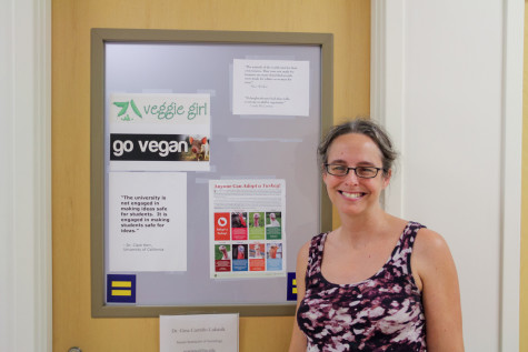 Proud vegetarian, Gina Carreno-Lukasik stands in front of her office door. Photo By Andrew Fraieli | Science Editor