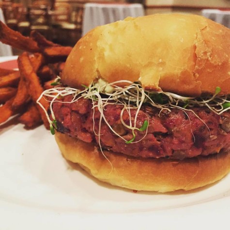 Bogart’s Bar & Grille offers a veggie burger filled with quinoa, lentils, zucchini, mushrooms and more. Photo courtesy of Bogart’s Facebook page.