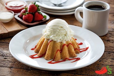 In celebration of Valentine’s Day, the white chocolate molten cake — drizzled with raspberry sauce — is available this week only at Chilli’s. Photo Courtesy of Chili’s Facebook page. 