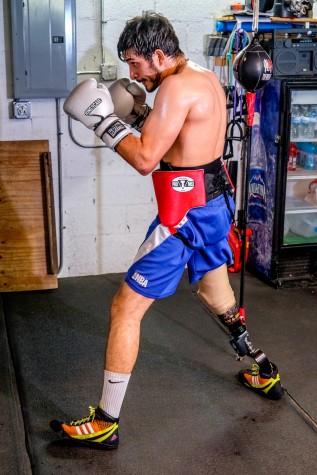 Diaz Mateus poses in his boxing stance. Mohammed F. Emran | Staff Photographer