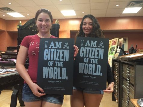 Dayle Labrada and Keinelys Maldonado, both sophomores majoring in biological sciences, pose with their prints. Benjamin Paley | Contributing Writer