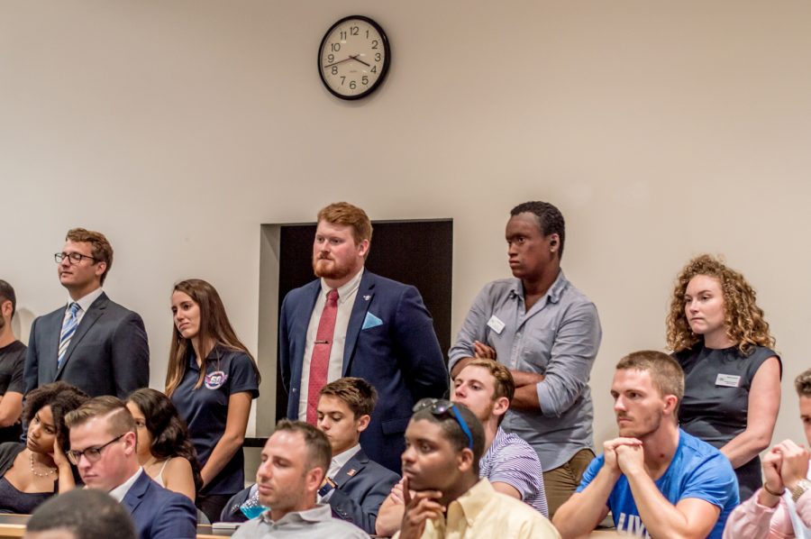 Members of Student Government watch Ezell deliver his state of the campus address. Jonathan Scott | Staff Photographer