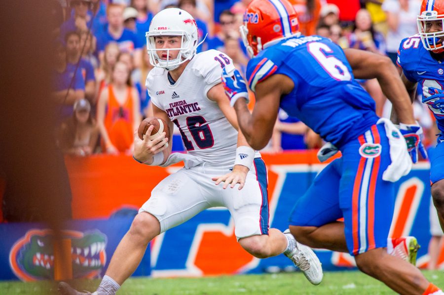 Redshirt sophomore Jason Driskel runs off the practice field prior to being named the starter for the season opener. Ryan Lynch | Editor in Chief