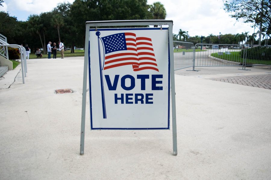 A sign stands near the FAU basketball arena two years ago informing students they could vote on the Boca campus. The same opportunity will be available to students who are registered to vote in Palm Beach tomorrow, Aug. 28. Photo courtesy of Ryan Lynch