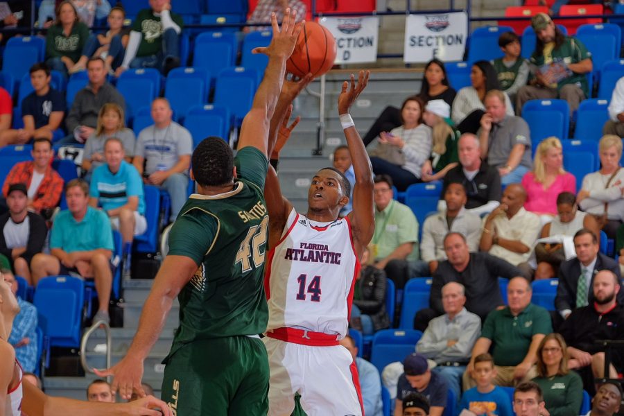 Junior Gerdarius Troutman made four 3-pointers in the Owls win over USF on Tuesday night. Mohammed F. Emran | Staff Photographer