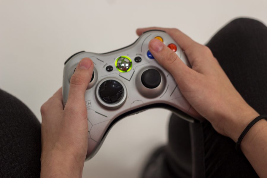 Brittany Ferrendi holds an Xbox 360 controller. Andrew Fraieli | Managing Editor