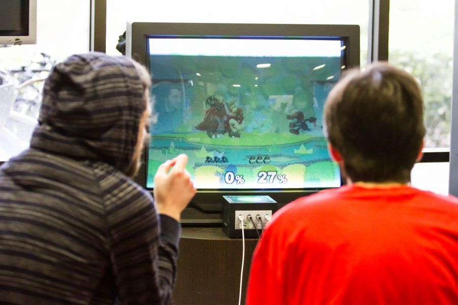 Graduate of Palm Beach State College Garen Mazmanian (left) competes with another player in Super Smash Bros. inside the Student Union. Alexander Rodriguez | Contributing Photographer