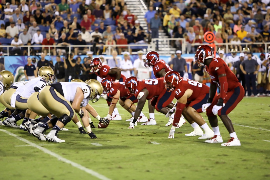 FAU’s defensive line prepares for a Navy offensive play during the third quarter of their game last Friday. Navy won 42-19. Alexander Rodriguez | Photo Editor