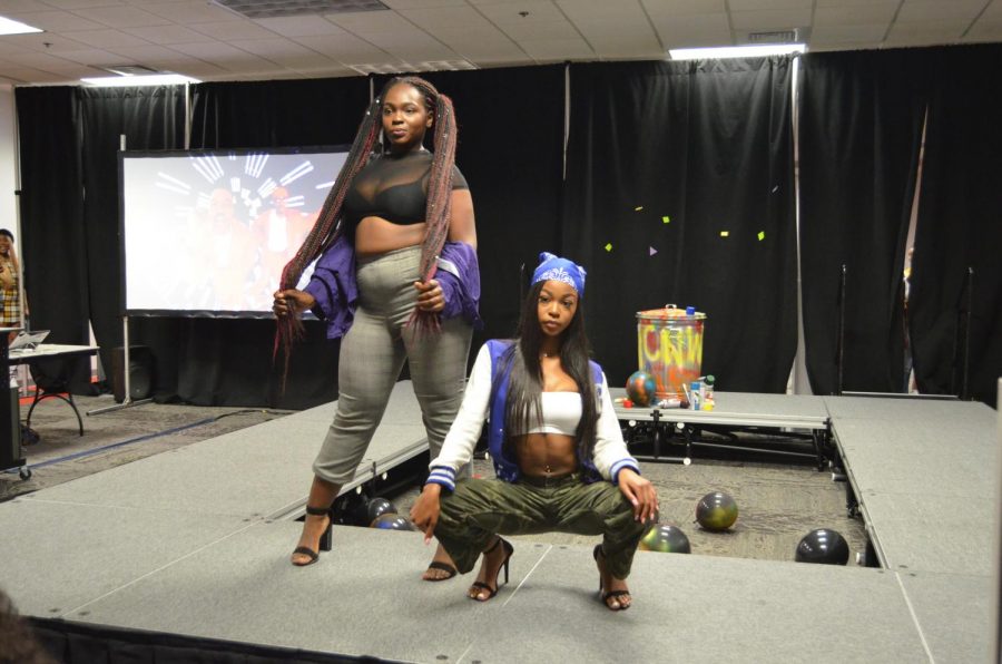 Student models pose in their outfits inspired by various themes of the 90s including: street wear, men of the 90’s, hip-hop culture, and the television show “All That.” Violet Castano | Staff Photographer 