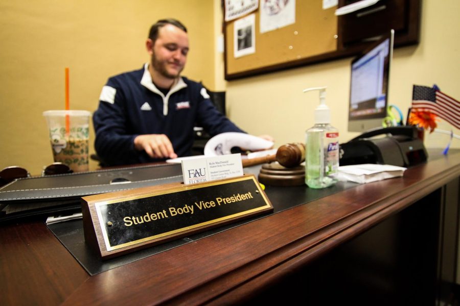VP-elect Kyle MacDonald sits at his desk in the Student Government offices. He has taken over as temporary student body president. Photo by Alexander Rodriguez