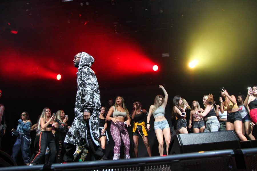 During Juicy J’s performance at OwlFest, he asked the audience if 20 female students could come up on stage with him. Photo by Alexander Rodriguez