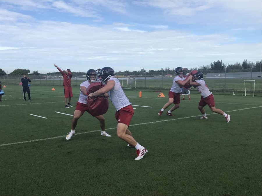 The tight ends working on blocking drills in the first fall training camp for FAU. Photo by: Zachary Weinberger