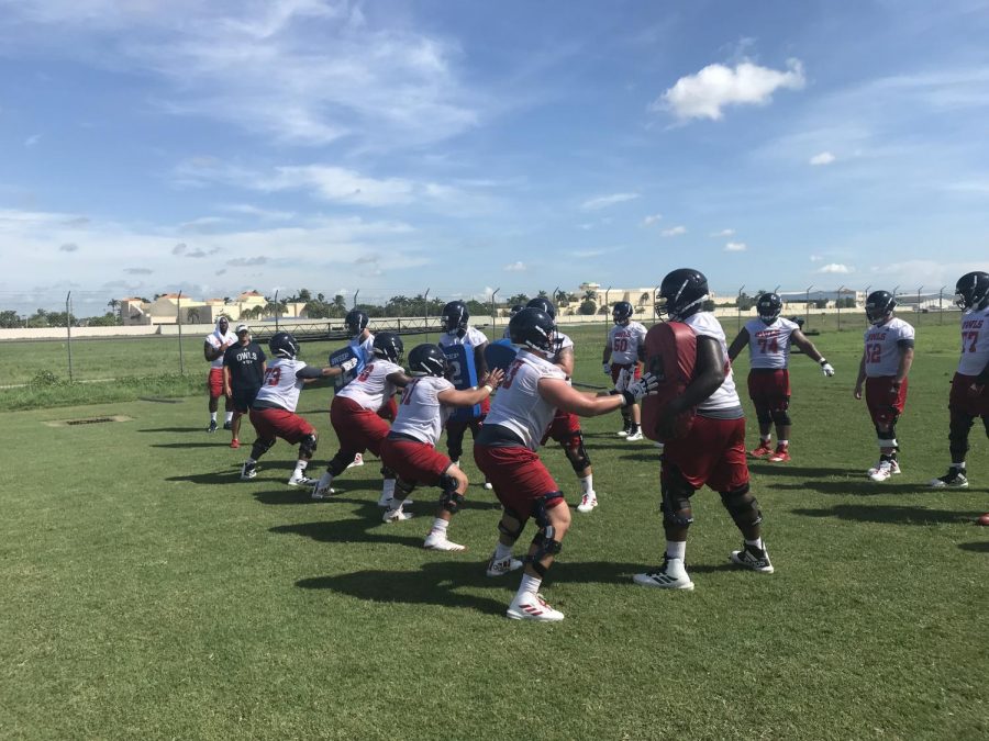 The offensive lineman practice blocking drills at the second day of fall training camp. Photo by: Zachary Weinberger